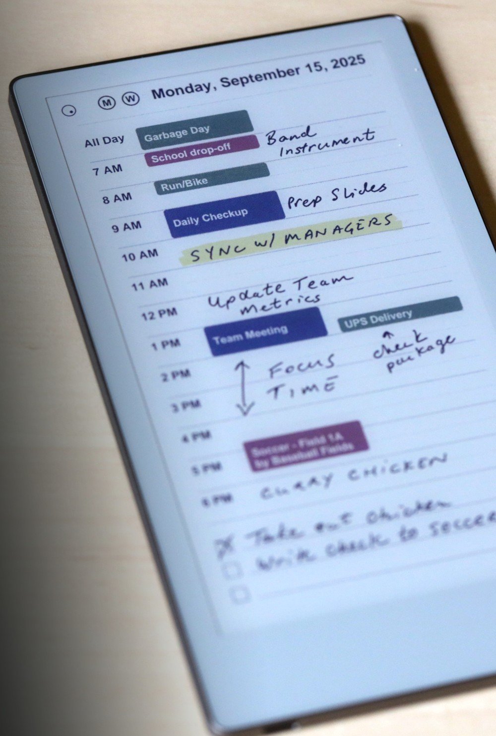 Planneriffic daily planner on a reMarkable tablet showing synced calendar events with handwritten notes